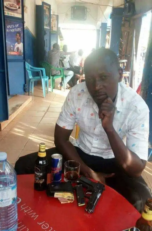 Man Spotted Getting High On Alcohol With His Pistol In Front Of Him.[See Photo]